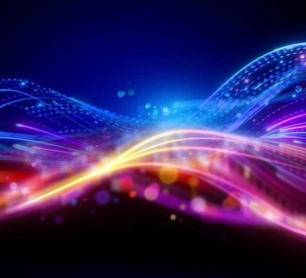 Oracle RMS website section for IT key professions featuring a vibrant abstract graphic of glowing fiber optic light waves and data trails next to a tech industry list